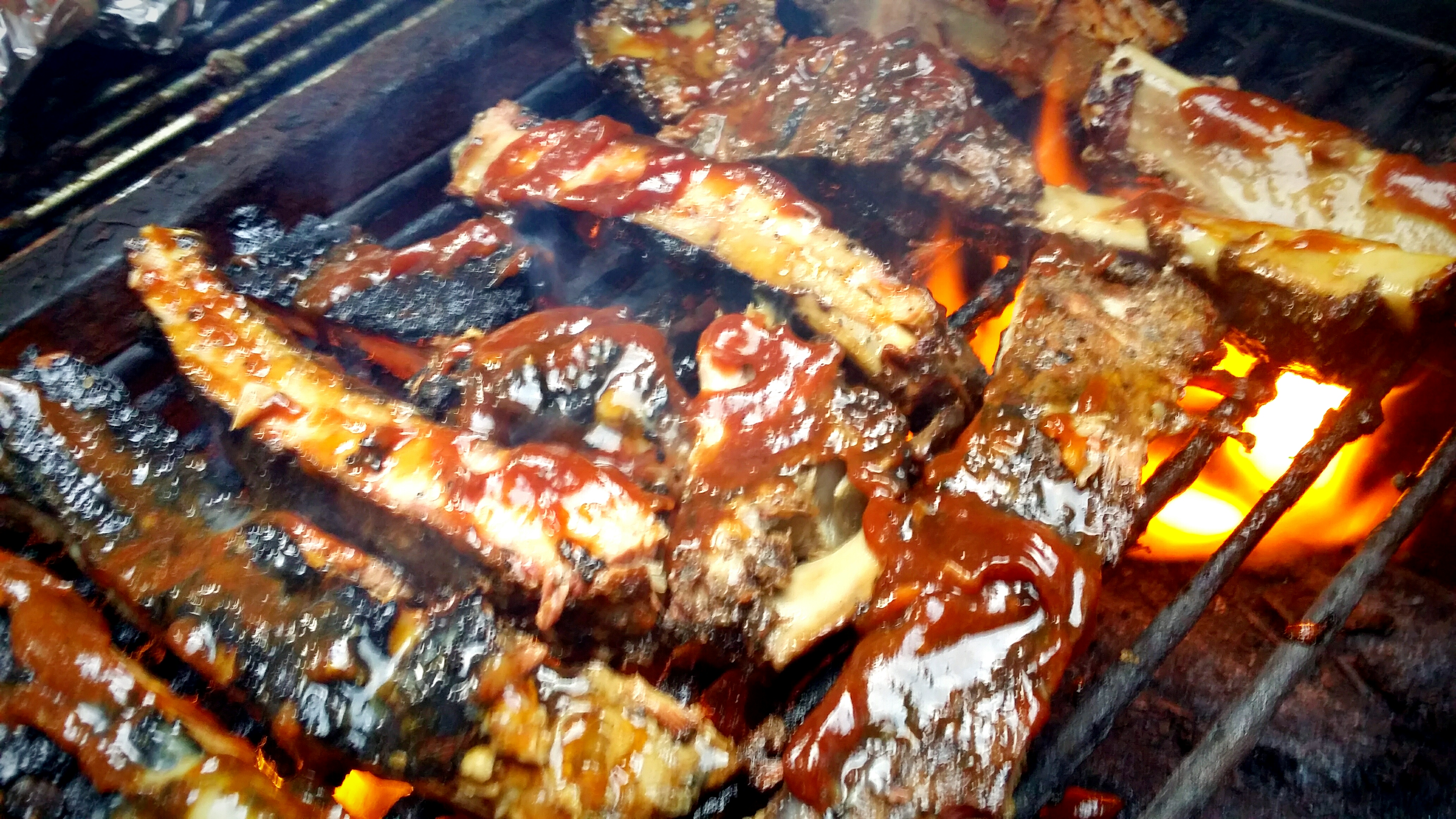 Backyard ribs over open flame